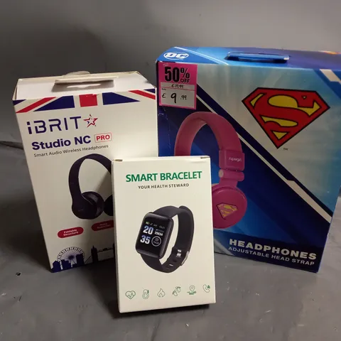 APPROXIMATELY 8 ASSORTED ITEMS TO INCLUDE iBRIT STUDIO NC HEADPHONES, SMART BRACELET, DC UPERGIRL HEADPHONES ETC