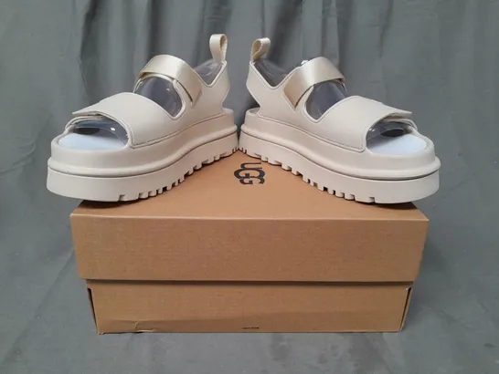 BOXED PAIR OF UGG GOLDENGLOW OPEN TOE PLATFORM SANDALS IN BEIGE UK SIZE 6