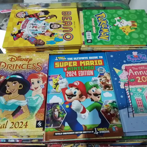 CAGE OF ASSORTED 2024 ANNUALS TO INCLUDE COCOMELON, DISNEY PRINCESS, POKEMON AND PEPPARD PIG