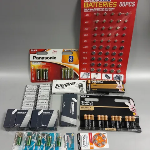 APPROXIMATELY 35 ASSORTED BATTERY PRODUCTS TO INCLUDE AA, AAA, BUTTON CELL ETC 