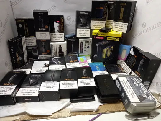 LOT OF APPROX 35 E-CIGARETTE ITEMS TO INCLUDE VOOPOO VINCI , ARGUS XT KIT CARBON FIBER , OXVN XLIM X-TREME FLAVOUR , ETC