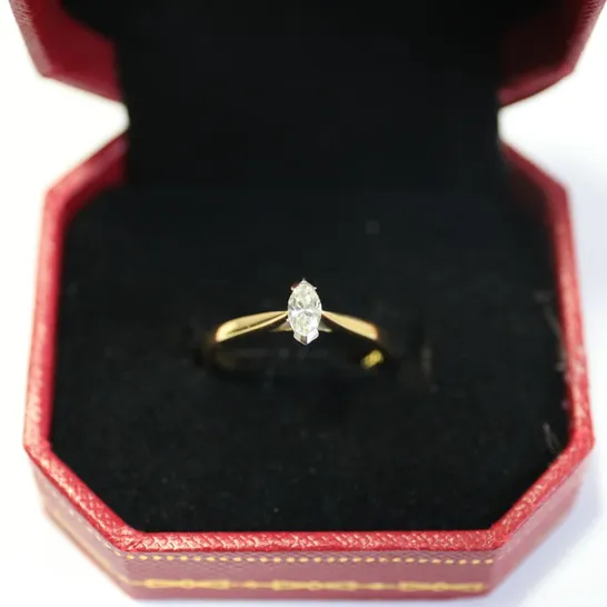 DESIGNER 18CT GOLD SOLITAIRE RING SET WITH A MARQUISE CUT DIAMOND