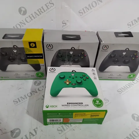 BOX OF FOUR ASSORTED WIRED XBOX CONTROLLERS INCLUDING THREE BACK AND ONE GREEN