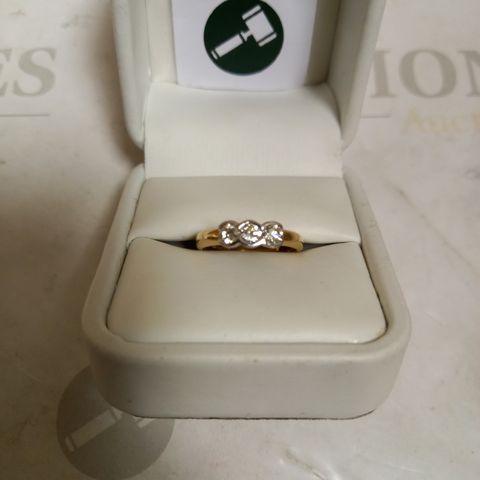 18CT GOLD THREE STONE TRILOGY RING RUB OVER SET WITH DIAMONDS