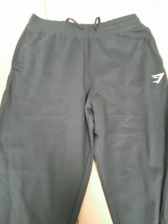 GYMSHARK BLACK TRACKSUIT BOTTOMS - SIZE MMEDIUM