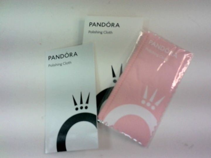 Lot 8007 PANDORA POLISHING CLOTH X12 PINK Simon Charles Auctioneers