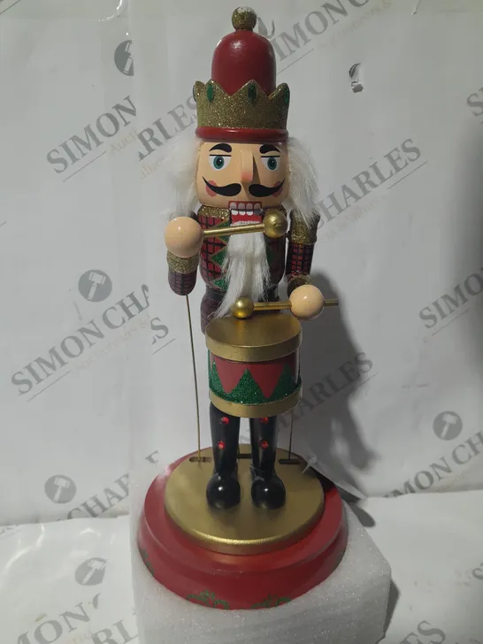 FESTIVE 32CM WOODEN ANIMATED MUSICAL NUTCRACKER