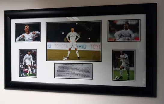 TWO FRAMED CRISTIANO RONALDO COLLAGES ONE DEPICTING HIS TIME AT REAL MADRID AND ONE DEPICTING HIS TIME WITH JUVENTUS