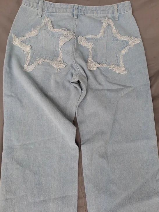 PRETTY LITTLE THING SHAPE WASHED BLUE DENIM STAR EMBOSSED JEANS SIZE 8