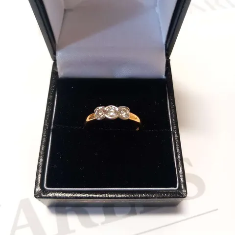 18CT GOLD THREE STONE RING RUB OVER SET WITH NATURAL DIAMONDS