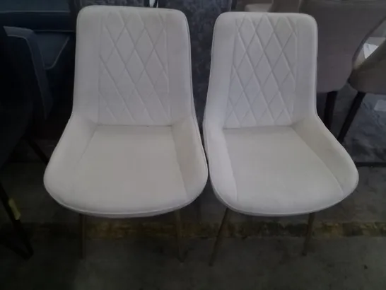 PAIR OF BEIGE FABRIC DINING CHAIRS WITH GOLD EFFECT LEGS