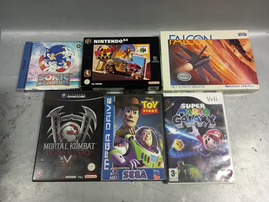 APPROXIMATELY 6 ASSORTED RETRO VIDEO GAMES TO INCLUDE FALCON, TOY STORY, MORTAL KOMBAT ETC 