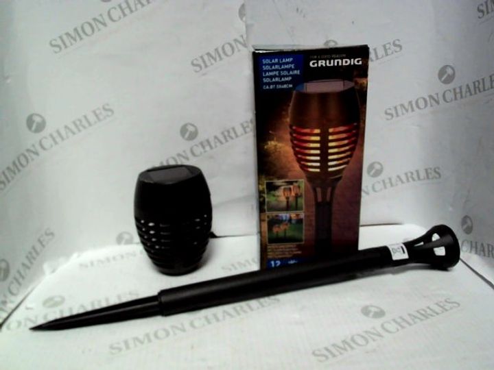 Lot 5587 GRUNDIG SOLAR LAMP WITH FLAME EFFECT Simon Charles Auctioneers