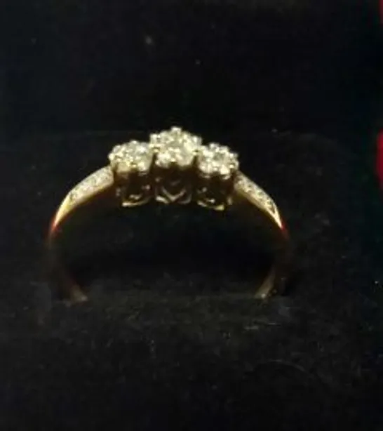 9CT GOLD RING WITH THREE DIAMOND SET CLUSTERS AND DIAMOND SHOULDERS