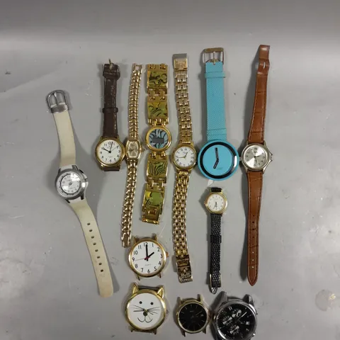 LARGE QUANTITY OF ASSORTED LOOSE LADIES & MENS WRIST WATCHES 