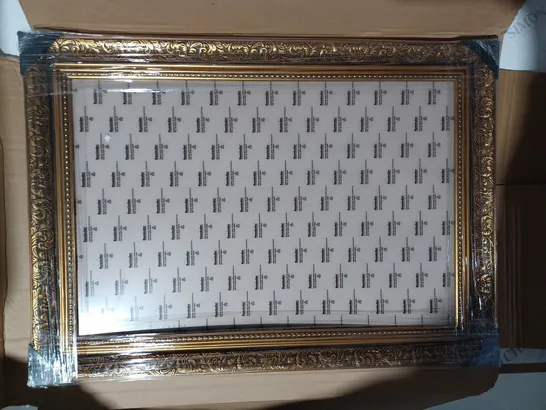 BOXED UNBRANDED ORNATE PICTURE FRAME IN ANTIQUE BRASS FINISH