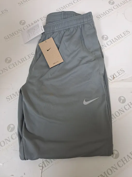 NIKE LOGO TRACKSUIT BOTTOMS SIZE M