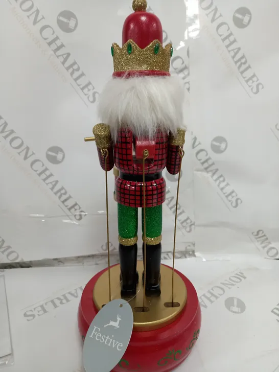 FESTIVE 32CM WOODEN ANIMATED MUSICAL NUTCRACKER