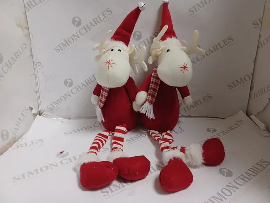 TWO BOXED PRE LIT DANGLY LEG REINDEER IN RED 