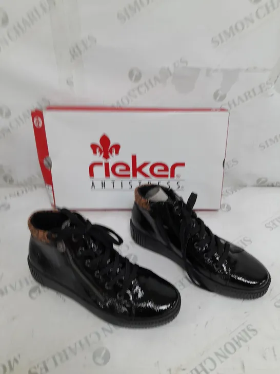 BOXED PAIR OF RIEKER HIGH TOP LEOPARD CUFF TRAINERS BLACK SIZE 5