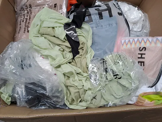 BOX OF APPROXIMATELY 25 ASSORTED CLOTHING ITEMS TO INCLUDE - SHORTS , SOCKS , DRESS ETC