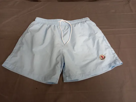 MONCLER SWIM SHORTS IN LIGHT BLUE SIZE L