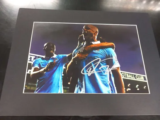 MOUNTED AND SIGNED VINCENT KOMPANY SIGNED PHOTOGRAPH