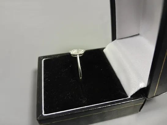 18CT GOLD SOLITAIRE RING SET WITH A MARQUISE CUT DIAMOND