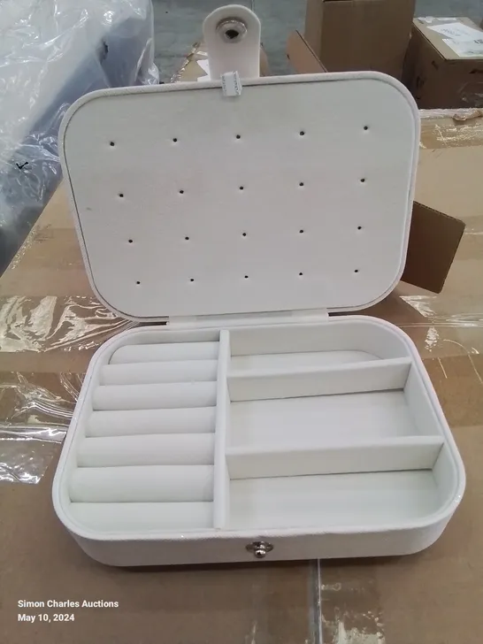 A BOX OF APPROXIMATELY 50 VANITY CASES IN WHITE WITH GLITTER EFFECT