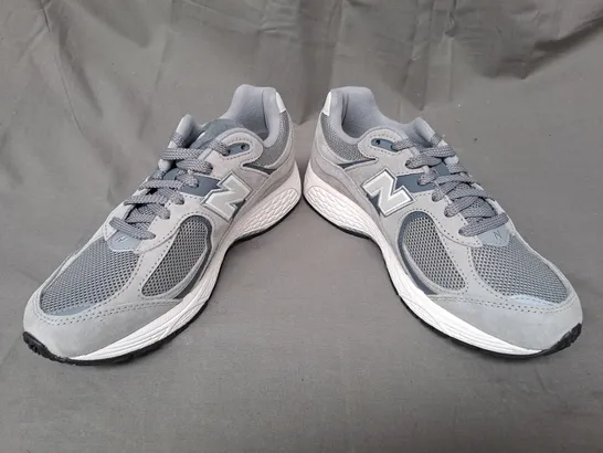 PAIR OF NEW BALANCE TRAINERS IN GREY UK SIZE 7