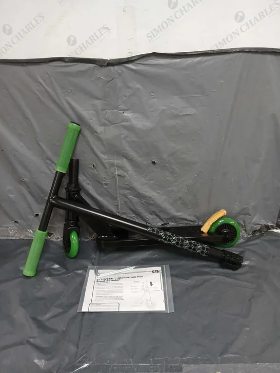 STUNTED GLOWSTORM PRO STUNT SCOOTER IN BLACK/GREEN