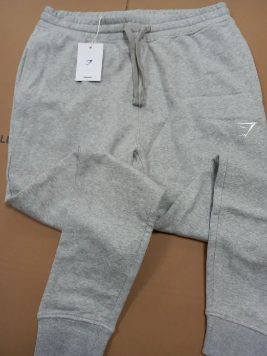 GYMSHARK CREST JOGGERS IN GREY - L