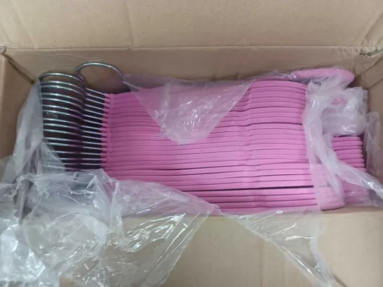 APPROXIMATELY 50 BOXED DECO EXPRESS VELVET HANGERS IN PINK