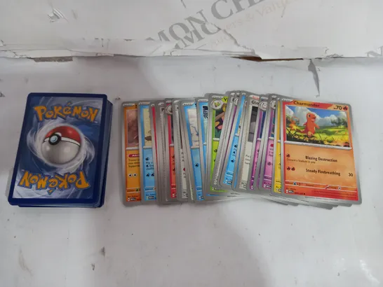 BOX OF APPROX 30 COLLECTABLE POKEMON TRADING CARDS