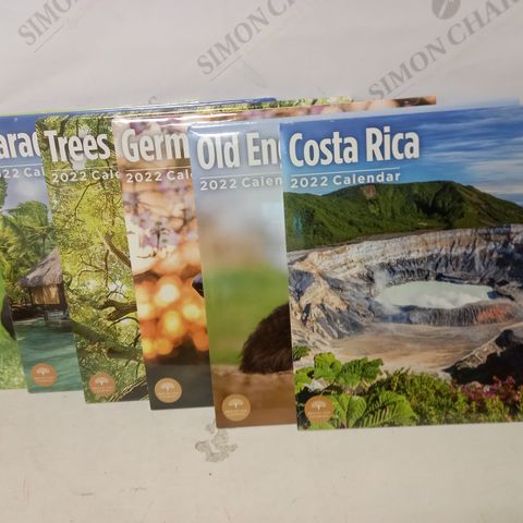 LOT OF APPROX 10 2022 CALENDERS TO INCLUDE COSTA RICA, TREES, PARADISE, ETC