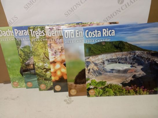 LOT OF APPROX 10 2022 CALENDERS TO INCLUDE COSTA RICA, TREES, PARADISE, ETC