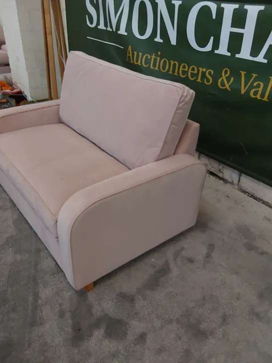 THE DUNSMORE LOVE SEAT SOFA BED UPHOLSTERED IN PETAL PINK FABRIC 