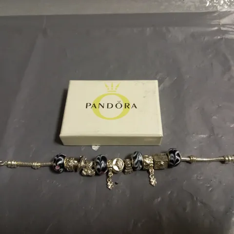 PANDORA BRACELET WITH VARIOUS CHARMS 