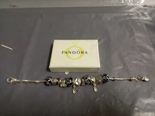 PANDORA BRACELET WITH VARIOUS CHARMS 