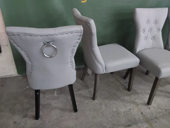 FOUR UPHOLSTERED BUTTONED BACK DINING CHAIRS GREY PU (3 PLAIN & 1 RING BACK)