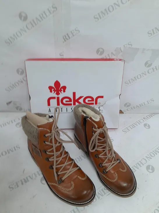 BOXED PAIR OF RIEKER WATER RESISTANT HIKING BOOTS IN BROWN ZIP UP SIZE 4