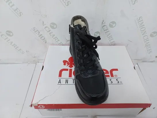 BOXED PAIR OF RIEKER WATER RESISTANT BOOTS IN BLACK SIZE 5