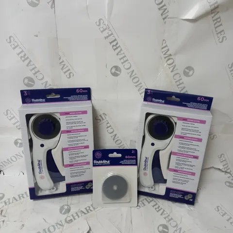 BOX OF 3 THREADERS CRAFT ITEMS TO INCLUDE X2 THREADERS ROTARY CUTTERS, X1 ROTARY CUTTER BLADES.