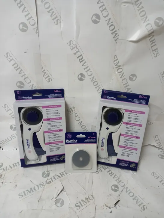 BOX OF 3 THREADERS CRAFT ITEMS TO INCLUDE X2 THREADERS ROTARY CUTTERS, X1 ROTARY CUTTER BLADES.