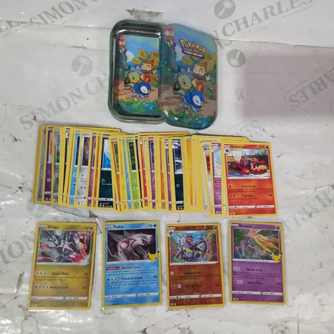 LOT OF ASSORTED POKÉMON TRADING CARDS W. TIN