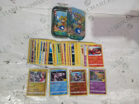 LOT OF ASSORTED POKÉMON TRADING CARDS W. TIN