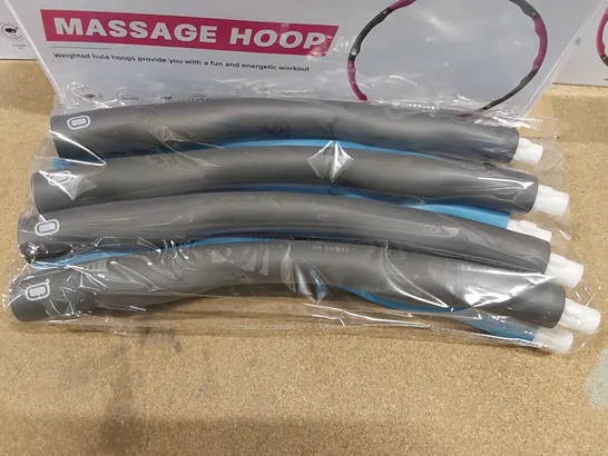 LOT OF APPROXIMATELY 5X BRAND NEW HULA FITNESS WEIGHTED MASSAGE HULA HOOPS (5 BOXES TAPED TOGETHER)