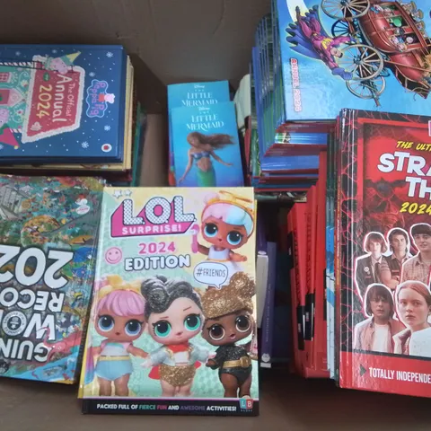 LARGE QUANTITY OF ASSORTED BOOKS AND 2024 ANNUALS TO INCLUDE GUINESS RECORDS 2024,  MINECRAFT, DANDY AND STRANGER THINGS