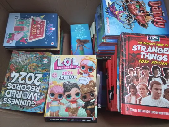 LARGE QUANTITY OF ASSORTED BOOKS AND 2024 ANNUALS TO INCLUDE GUINESS RECORDS 2024,  MINECRAFT, DANDY AND STRANGER THINGS