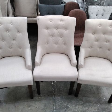 6 DESIGNER CREAM FABRIC CHAIRS WITH BUTTONED BACK,  SMALL ARM RESTS AND WOODEN LEGS 